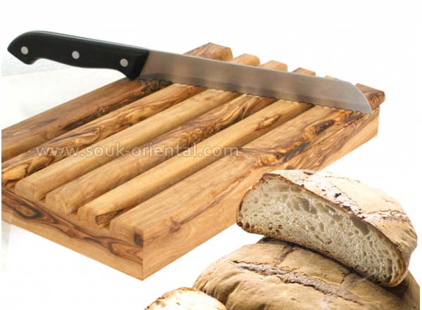 Cut bread into olive wood crafts